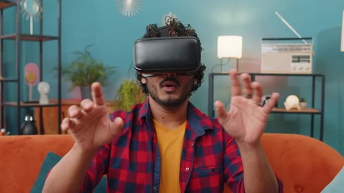 Man Experiencing Virtual Reality Headset in Living Room