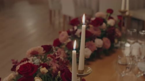 Elegant Table Setting with Flowers and Candles