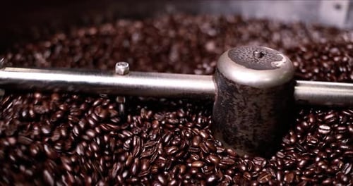 Coffee Beans Being Roasted in Industrial Machine
