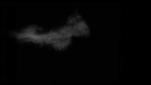 Sahara Collection: A small sand stream erupting from the bottom side and scattering slowly at the en