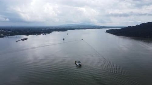 Ferries carry passengers sailing on the Kalimantan sea