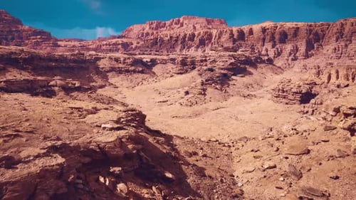 Aerial View Captures Broad Canyon Features and Layered Landforms