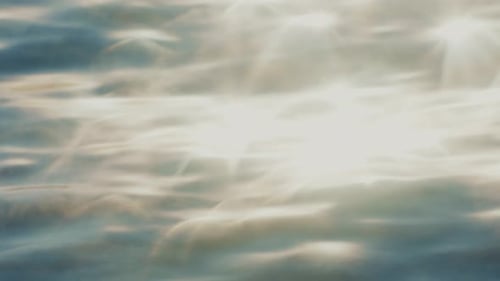 Sunlight Reflections on Glistening Ocean Water