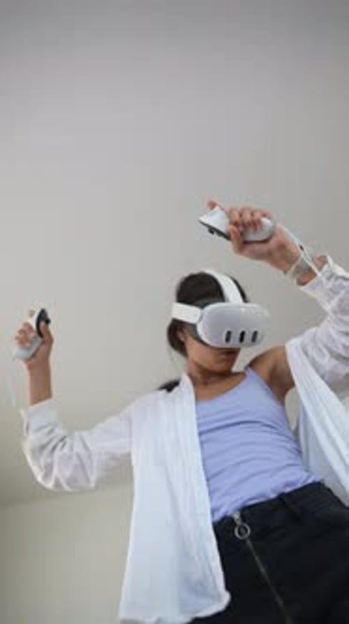 Woman Immersed in Virtual Reality Gaming at Home