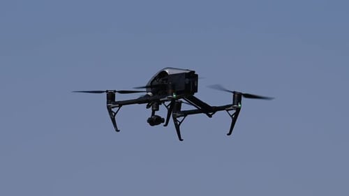 The drone fling on a bright sunny day, Drone hovering, Drone camera, quadcopters