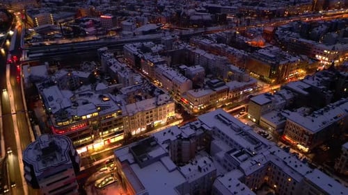 Berlin Steglitz shopping street in Snow at winter evening. Stunning aerial view drone