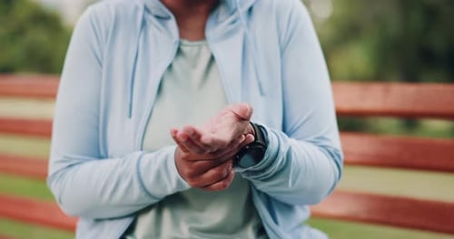 Adult Wears Smart Watch and Rubs Wrist