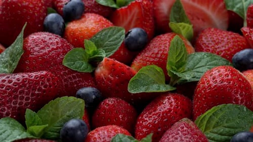 Fresh Strawberries, Blueberries, and Mint Close Up