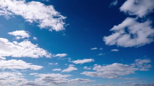 Timelapse of Cumulus Clouds Moves In The Blue Sky