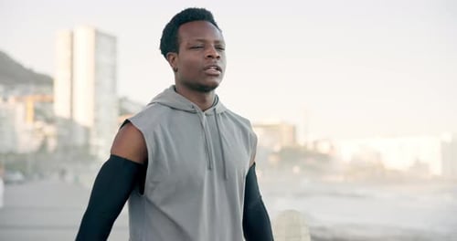 Ocean, stretching and man with fitness, warm up and morning routine for health benefits