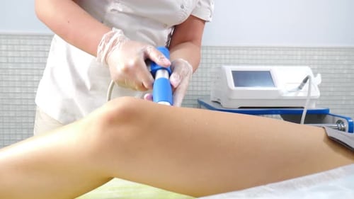 Shock Wave Therapy Treatment Physiotherapist Cures Knee Injuries and Nerves Method of Treatment with