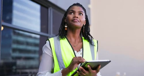 Engineering woman, thinking and planning on tablet at construction site