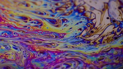 Pintura a óleo de superfície iridescente de cor arco-íris vívida