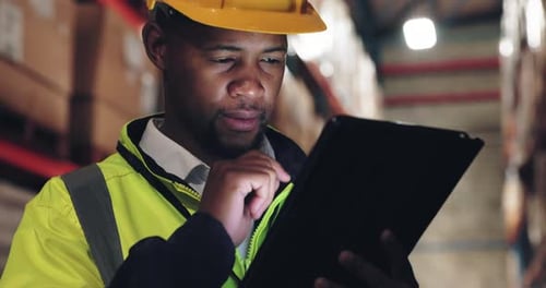 Warehouse engineer, black man and tablet to check stock, inventory or storage app