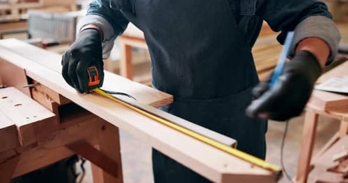 Workshop, wood and male carpenter for construction, project and woodwork with measurement