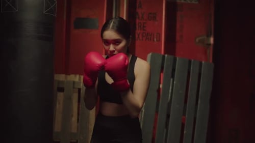 Strong Woman Boxer Ready to Fight