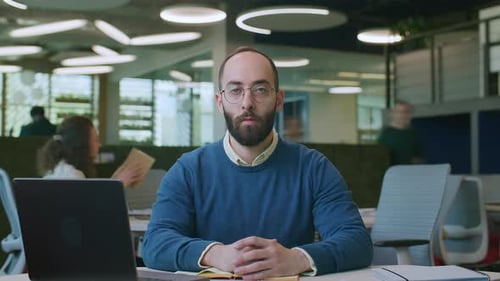 Timelapse Portrait of Serious Businessman Working at Desk in Office