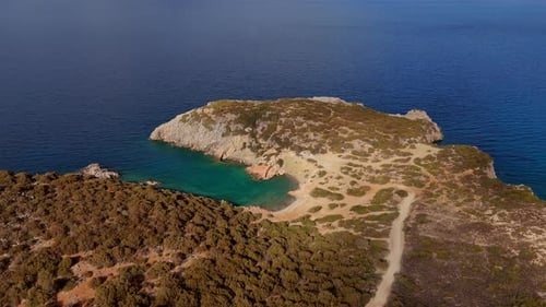 Aerial - remote and untouched beach with turquoise waters on Crete island, Greece