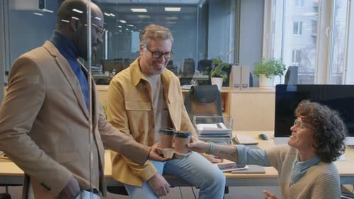 Colleagues Taking a Coffee Break at the Office