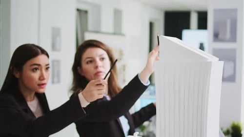 Office Engineers Studying 3d Printed Model in Coworking Space