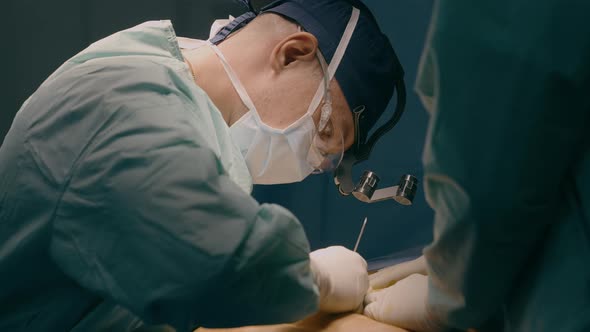 Two Doctors Operating Patient in Clinic Hospital Surgeon Man Medic ...