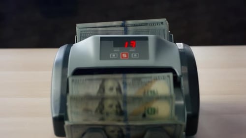 Money Counter Processing US Hundred-Dollar Bills