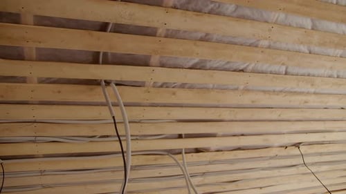 Wooden Beams and Wiring in Home