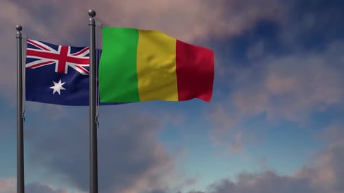 Australia and Mali Flags Waving in Blue Sky
