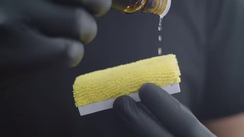 Liquid Being Poured onto Sponge
