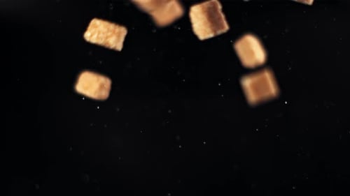 Sugar Cubes Falling on a Black Background Filmed on a Highspeed Camera at 1000 Fps
