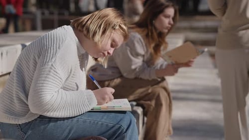 Young Adults Studying Together in an Urban Environment