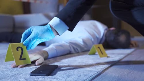 Man Lying on Floor After Crime Scene