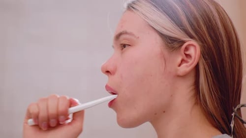 Close Up Side View Young Woman Brushing Teeth For Oral Hygiene