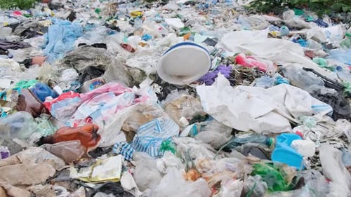 The Beach is Littered with Empty Dirty Plastic Bottles and Various Chemical Wastes Vertical Video