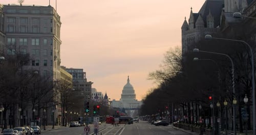 U.S. Capitol Building In Washington D.C. With Dramatic Orange Sky And Symmetric Center Framing