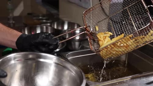 Chef Dumps French Fries into Bowl