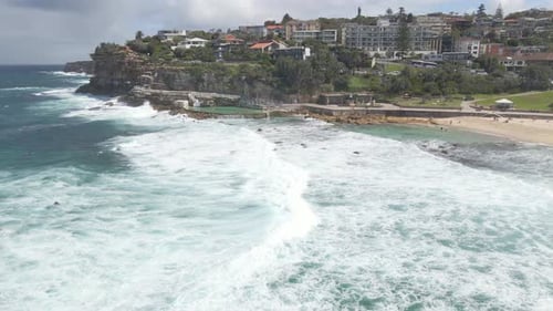 Foamy White Waves Rolling In The Ocean - Bronte Beach And Saltwater Rock Pool In Summer - NSW, Austr