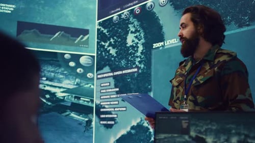 Man in Camo Briefs Staff in Operations Room