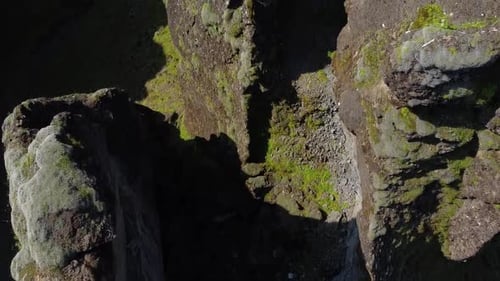 Fjaðrárgljúfur Canyon Cliffs in aerial drone downwards shot, Iceland