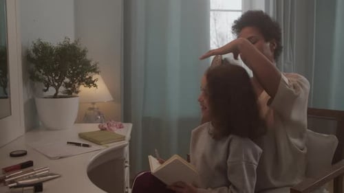 Adult Styles a Young Girl's Hair