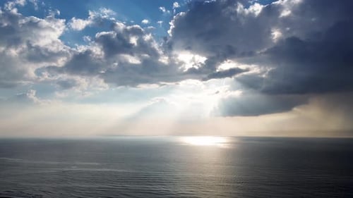 Beautiful sunset over the sea, ocean. Top view from a quadcopter. Beautiful flight.