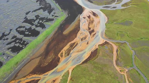 Aerial view of a river along the coast, Iceland.