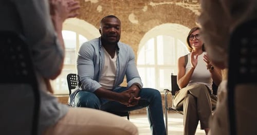 Support Group Meeting in Bright Room