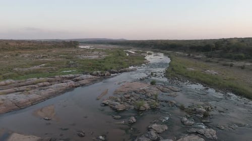 Circular panoramic view over a seasonal river.