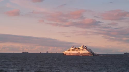 Luxury Cruise Ship Leaving the Port of Gdansk Poland at Sunset