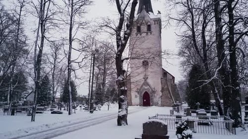 Cemetery and church in December in estonia 3