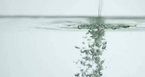 Fresh Water Pouring into more Water