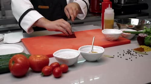 Restaurant's Chef Prepares Raw Beef Into Large Chunks He is Preparing Steak Tartare Slow Motion