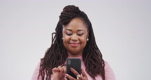 Smiling Woman Using Cell Phone