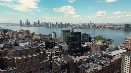 Ascending view of river and manhattan skyline